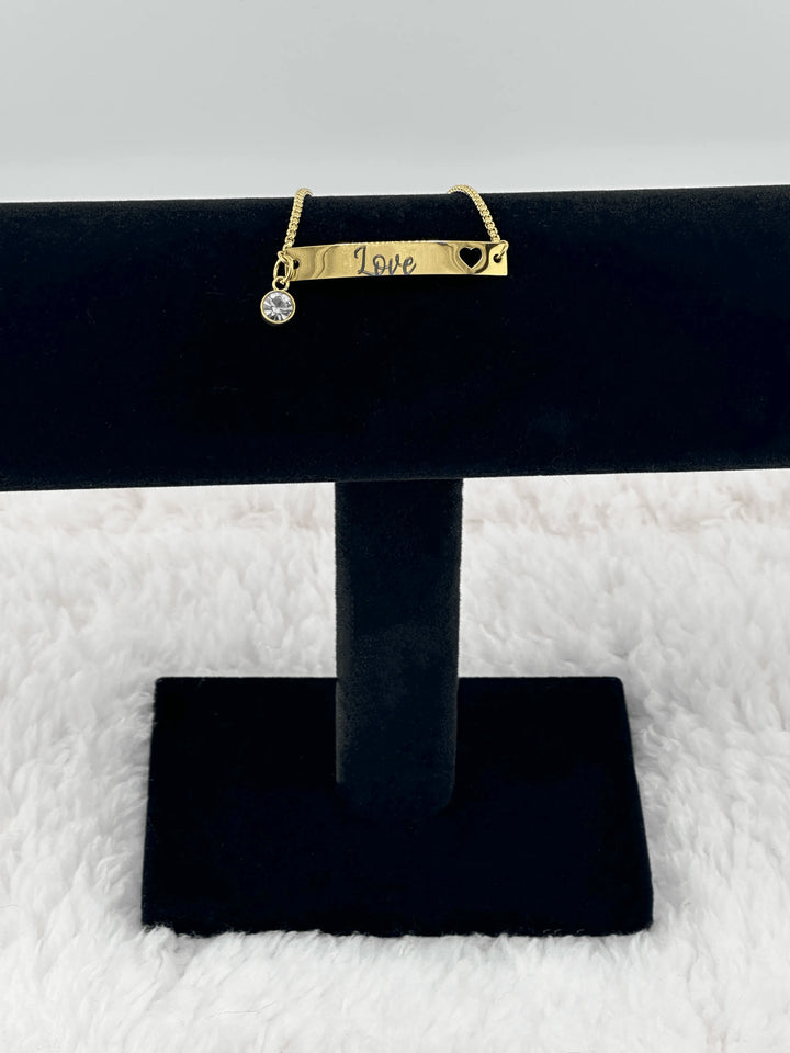 Elegant Adjustable Curved Bar Bracelet with Heart in 18K Gold PVD Stainless Steel